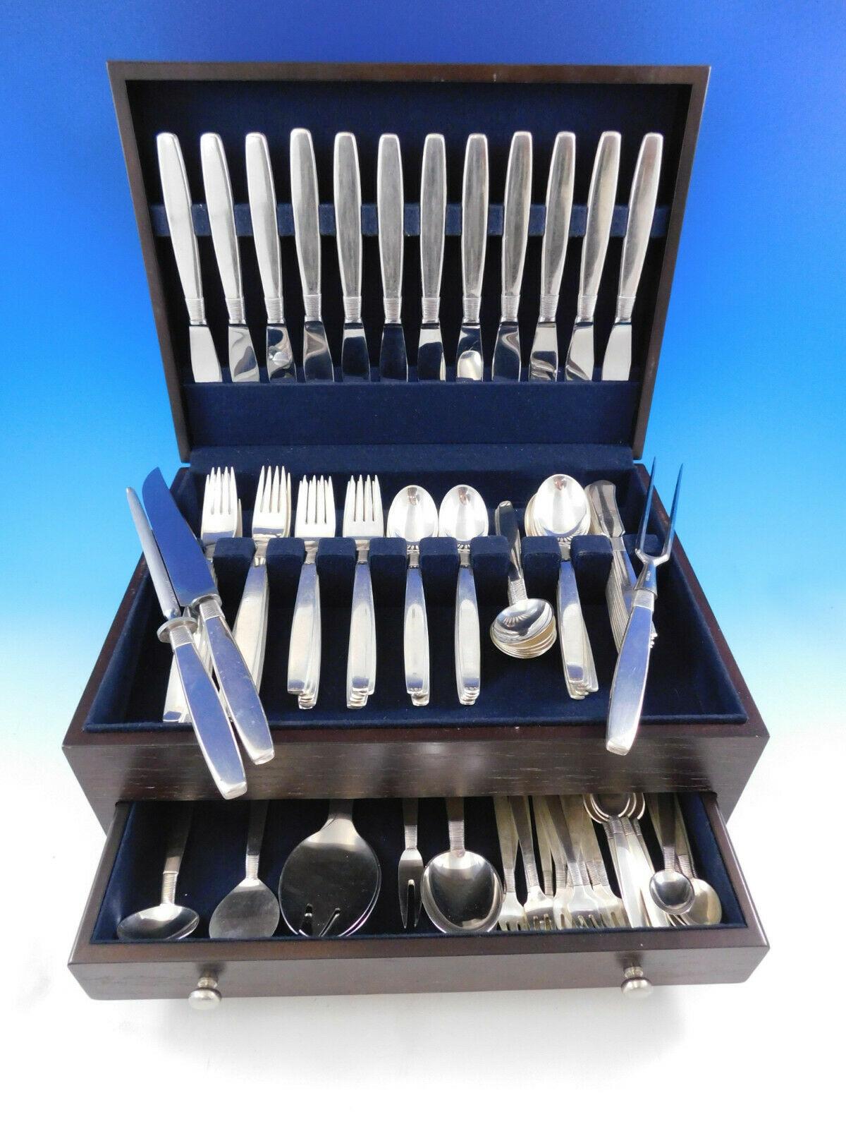 Silver thread by Franz Hingelberg Danish sterling silver flatware set - 104 pieces. Fabulous Mid-Century Modern design. The pattern design has the appearance of thread being 