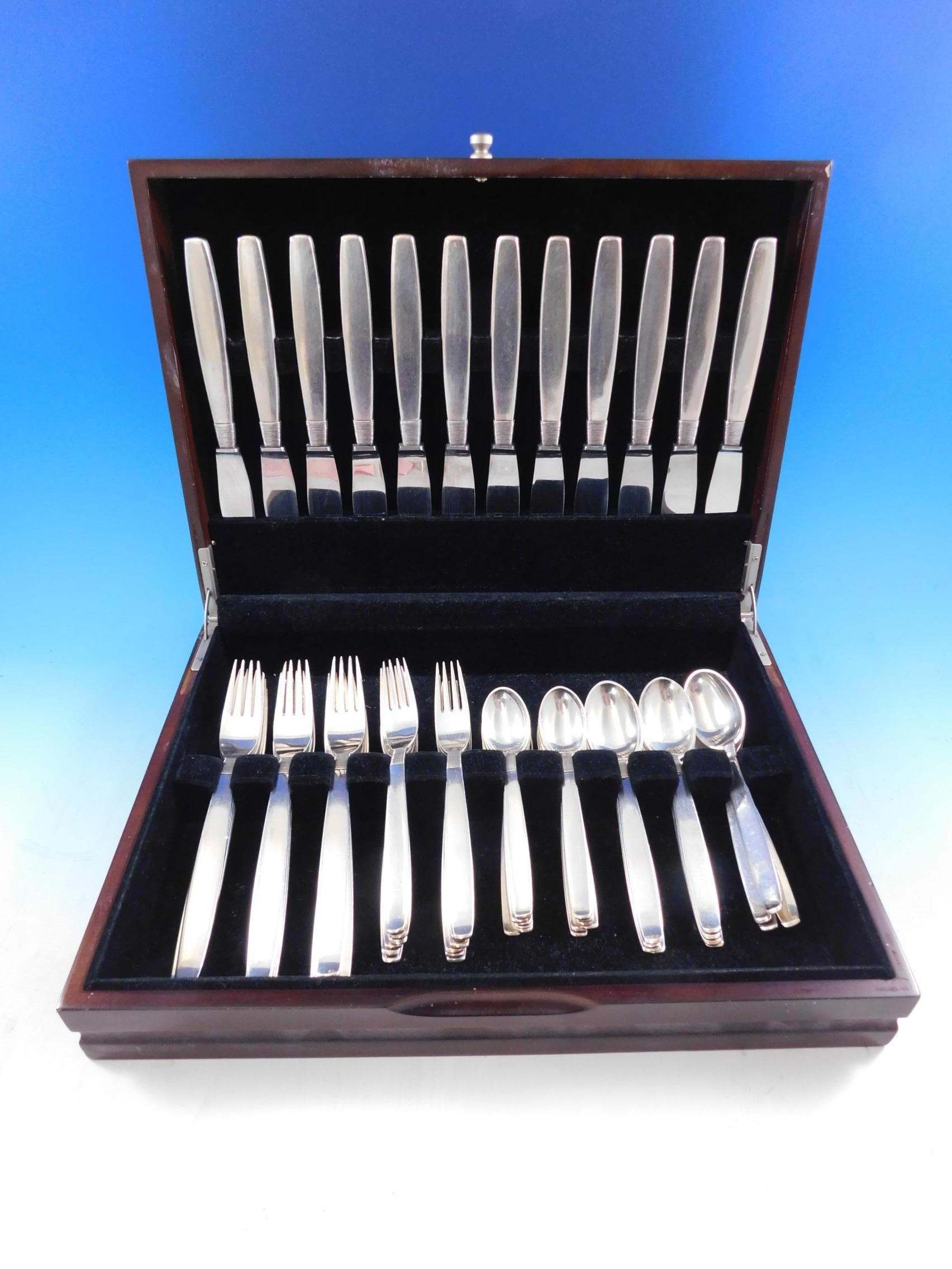 Silver thread by Franz Hingelberg Danish sterling silver Flatware set - 60 pieces. Fabulous Mid-Century Modern Design. The pattern design has the appearance of thread being 