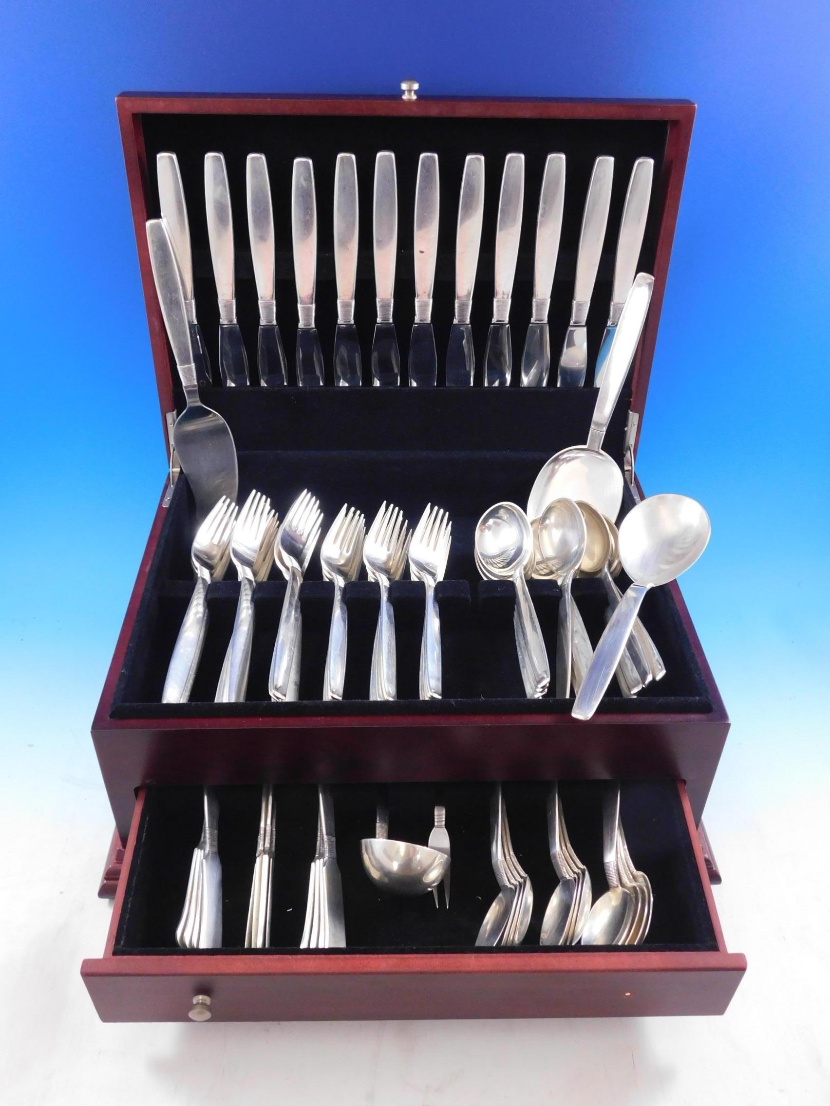 Silver thread by Franz Hingelberg Danish sterling silver flatware set, 77 pieces. Fabulous Mid-Century Modern design. The pattern design has the appearance of thread being 