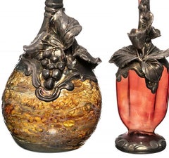 Silver - Three perfume bottles