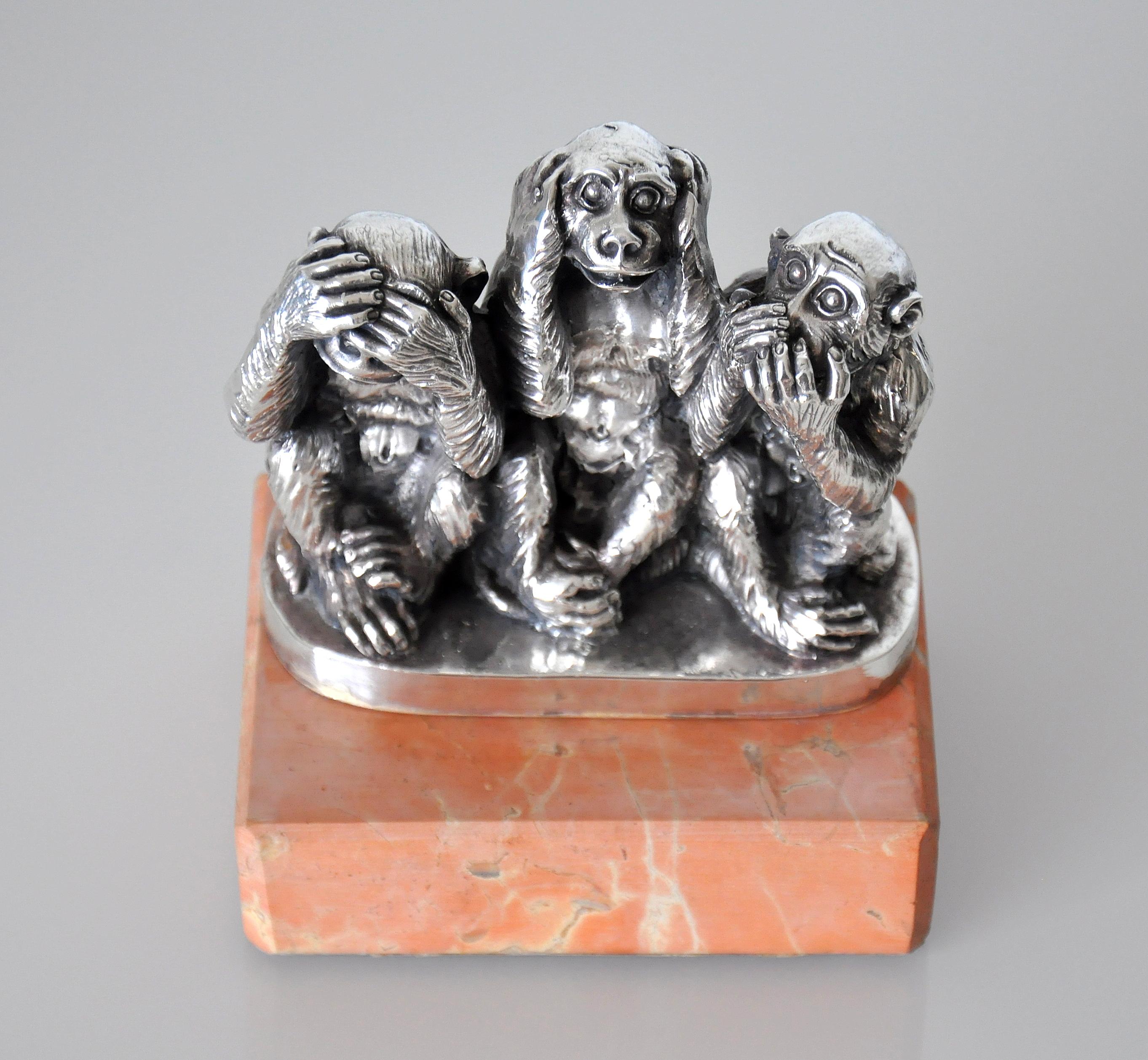 silver monkey statue