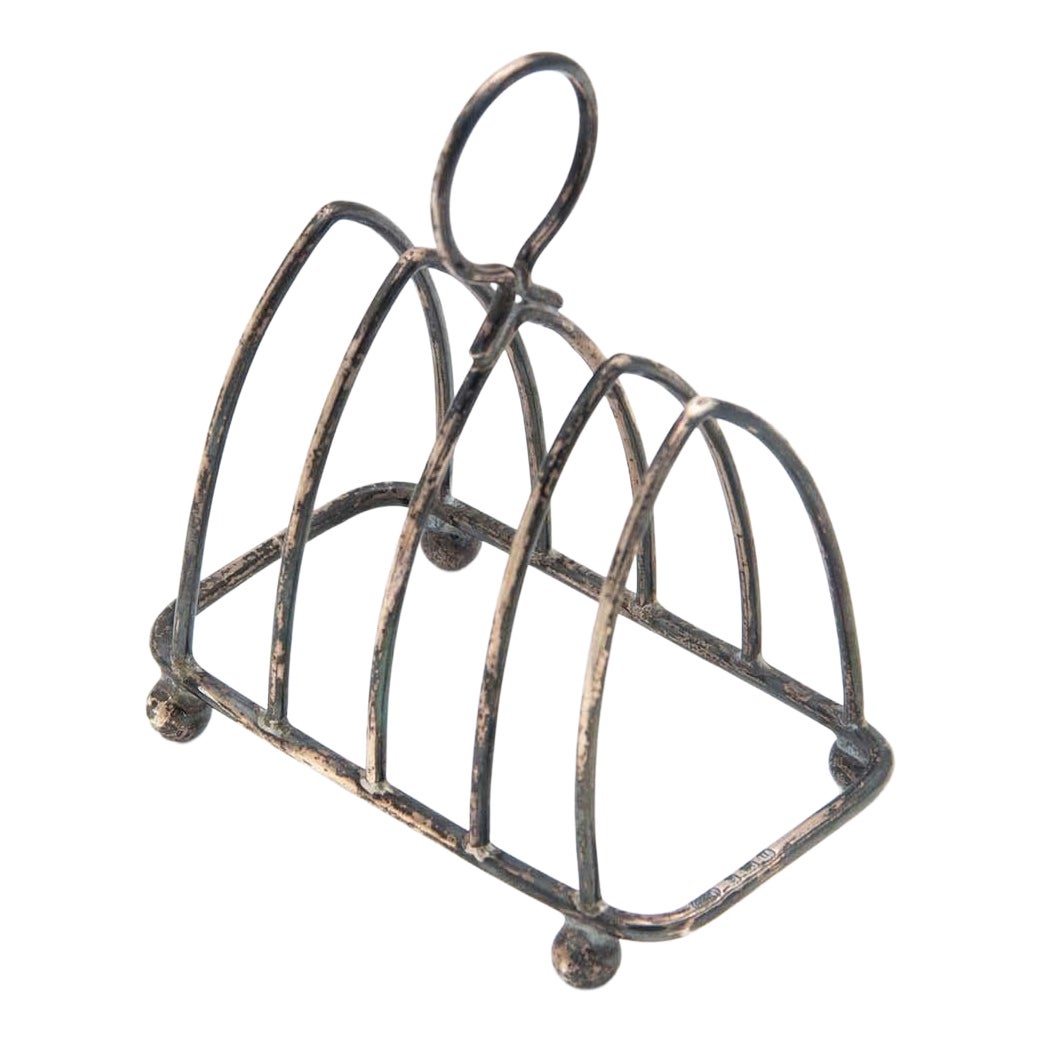 Silver toast rack with capacity for four units