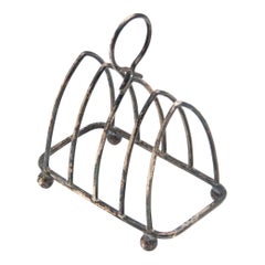 Silver toast rack with capacity for four units