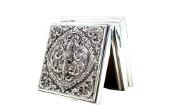 Silver tobacco box with embossed Hindu goddess and wood lining