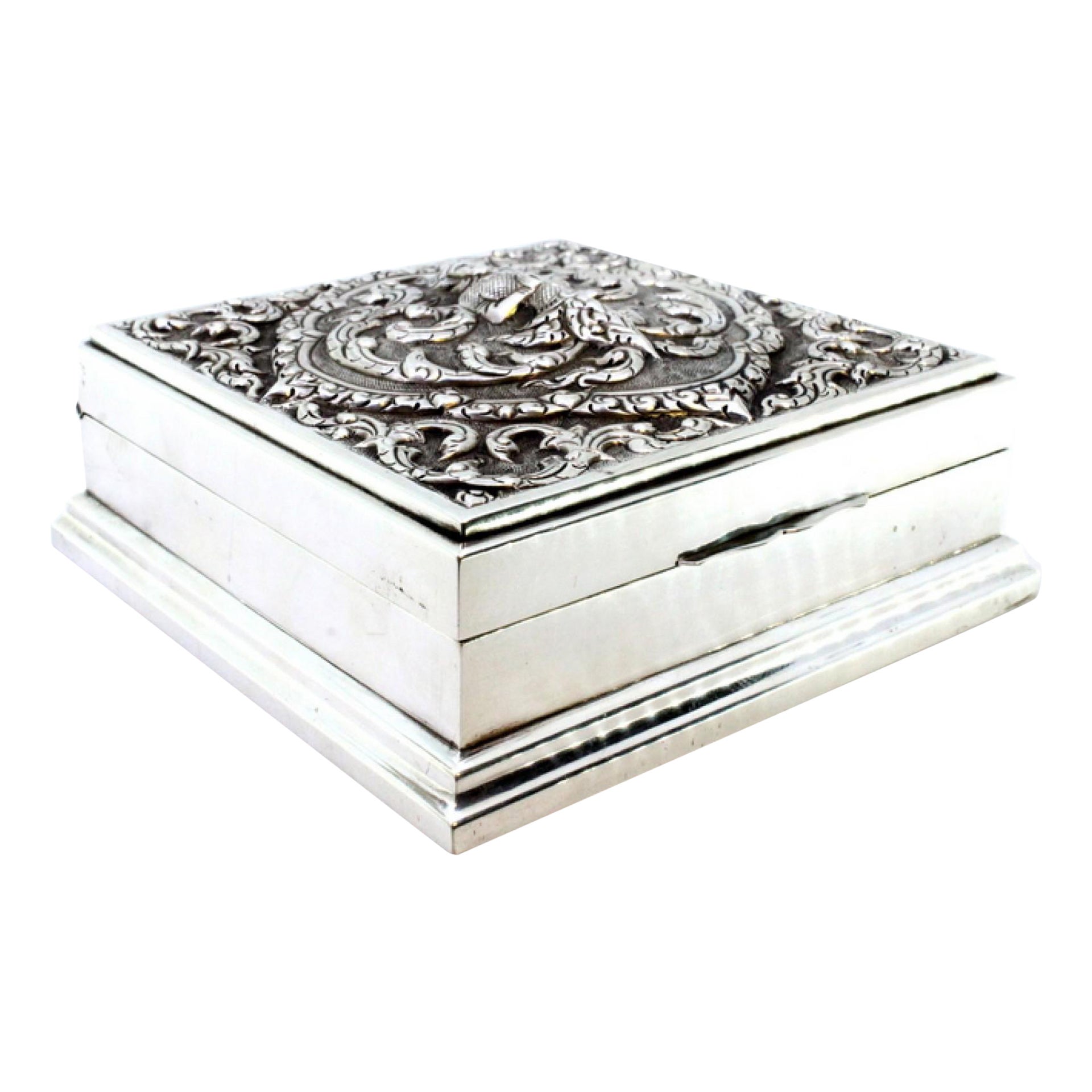 Silver tobacco box with embossed Hindu goddess and wood lining