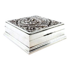 Silver tobacco box with embossed Hindu goddess and wood lining