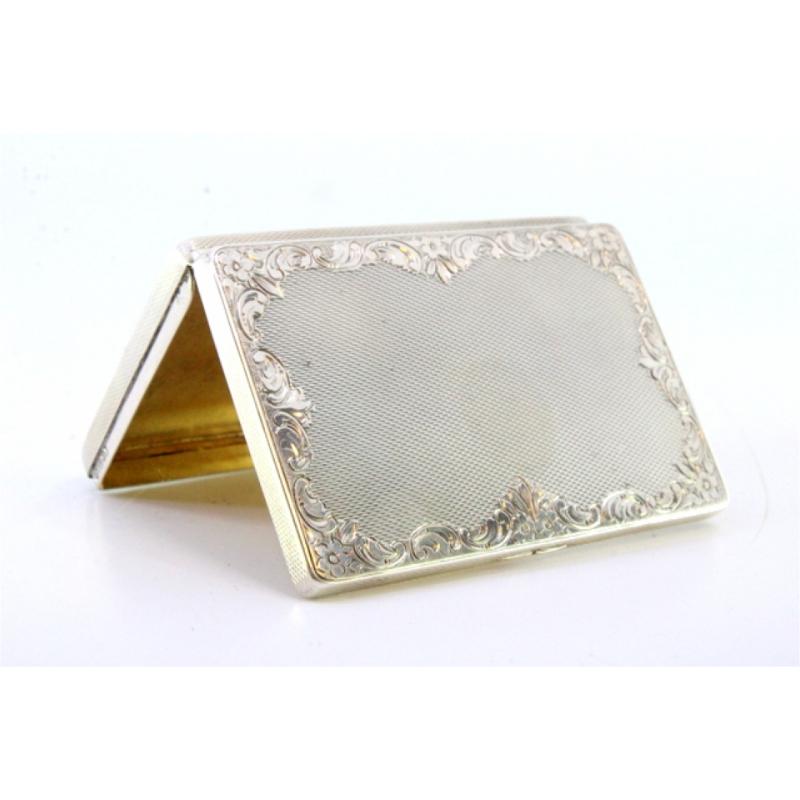 European Silver tobacco box with guilloche floral motifs, gold interior and hinged lid For Sale
