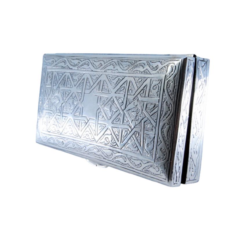 Silver tobacco box with Islamic-style reliefs and a wood-lined interior