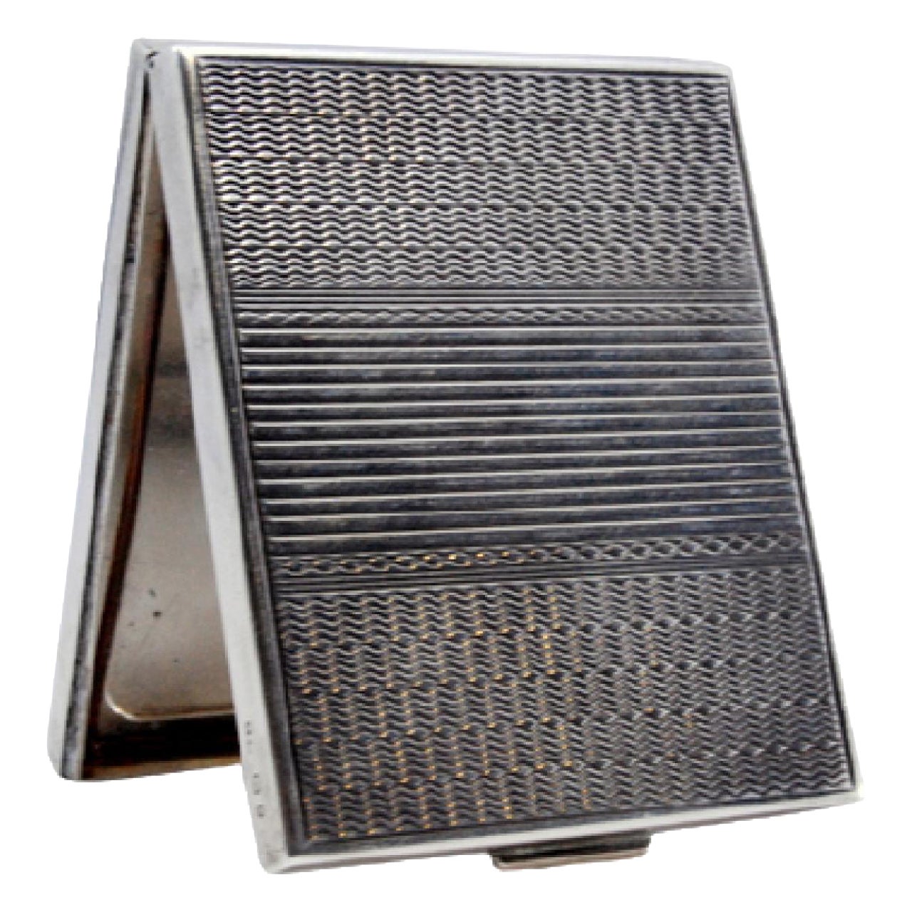 Silver toiletry box with asymmetrical engraving on both sides