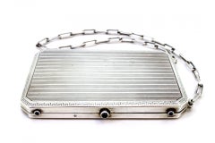 Silver toiletry box with engravings, compartments and writing tools