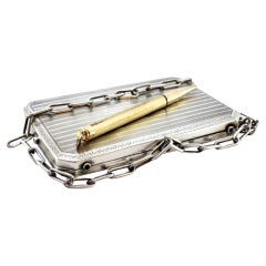 Silver toiletry box with engravings, compartments and writing tools