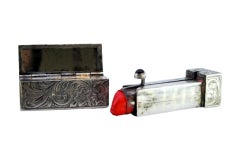 Silver toiletry box with engravings, red cabochon and mirror lipstick