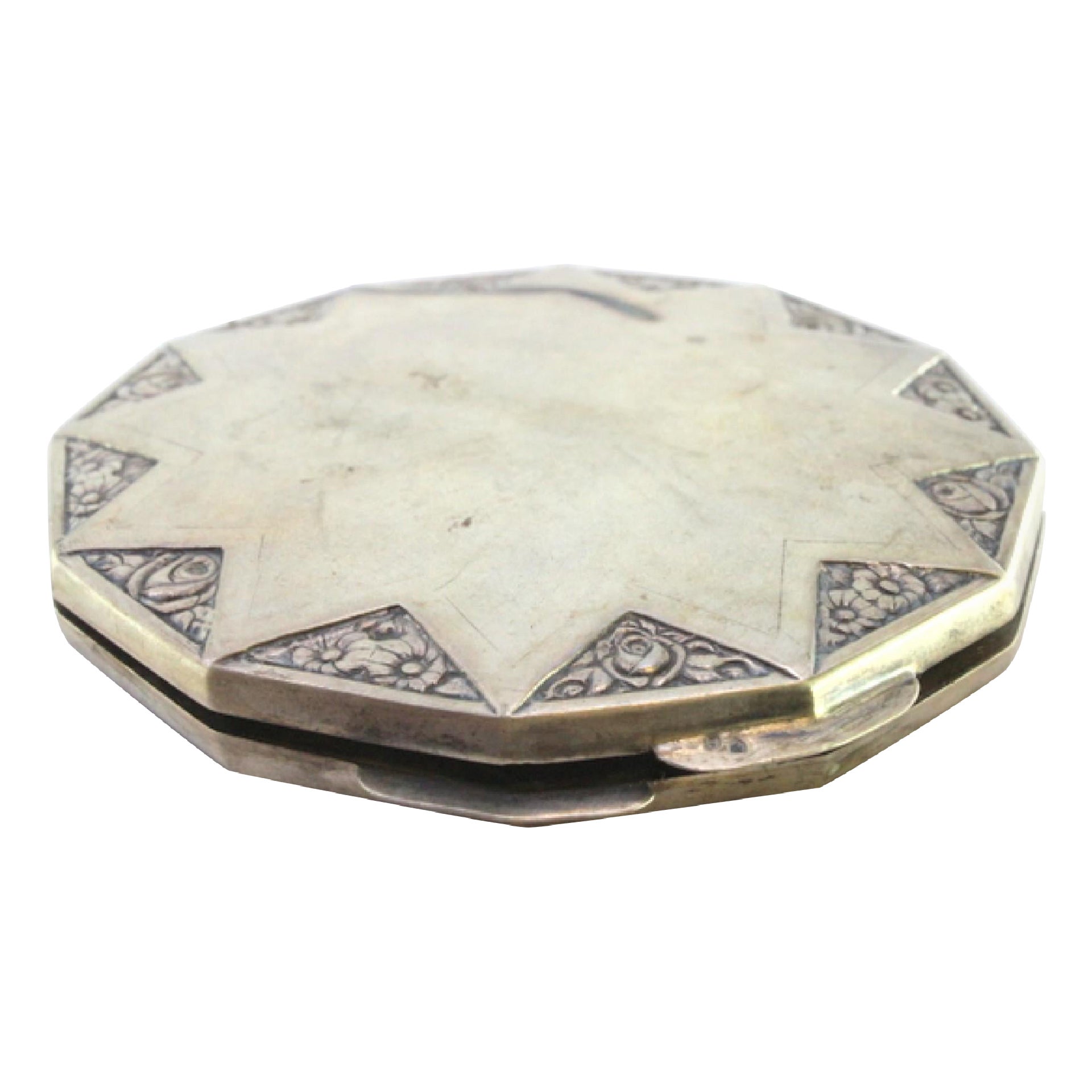 Silver toiletry box with floral reliefs, opening appliqué and mirror inside