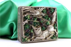 Silver toiletry box with fox-and-bird relief and enameled lid