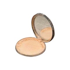 Silver toiletry box with garland-engraved lid and guilloche bands