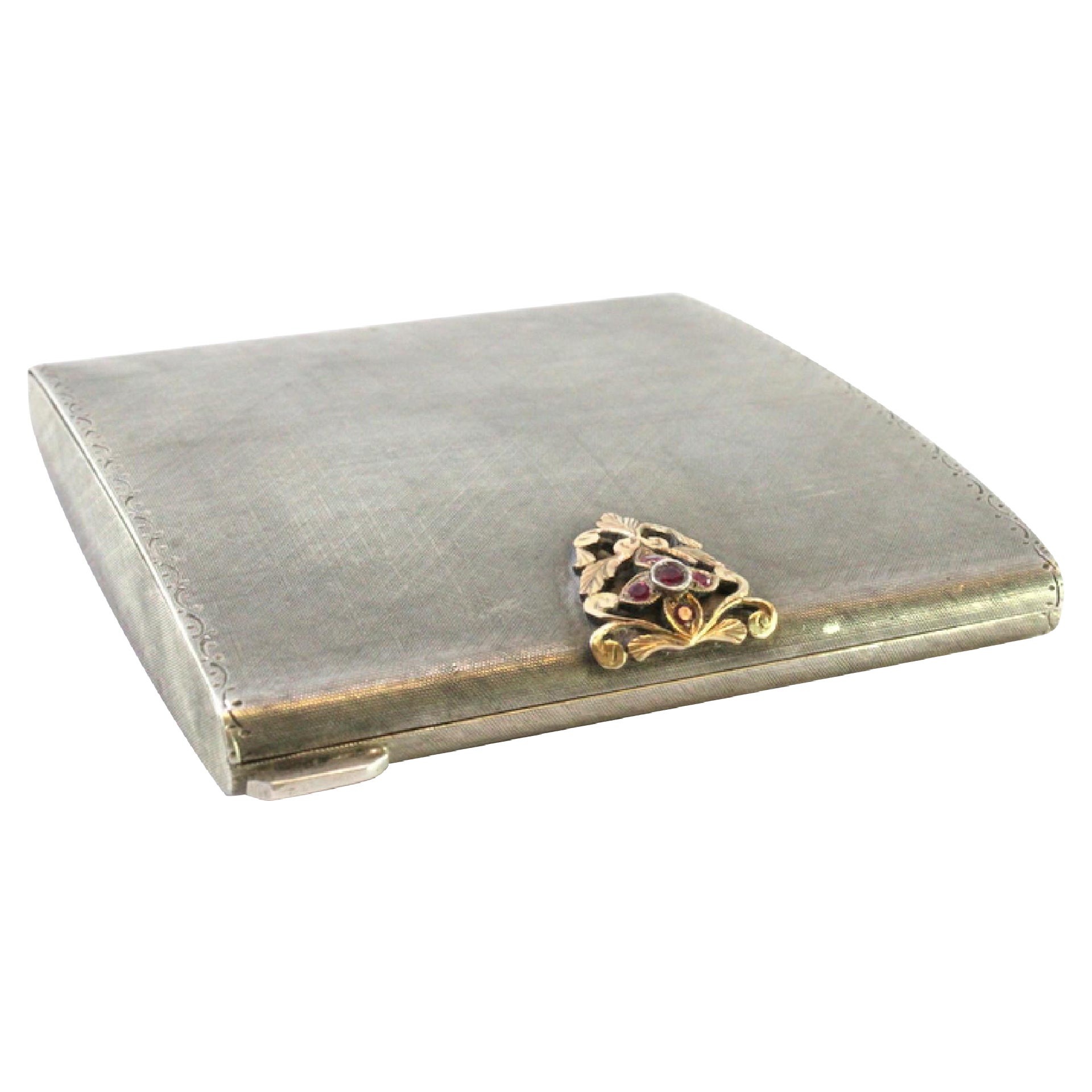 Silver toiletry box with gold clasp and synthetic stones and mirror inside