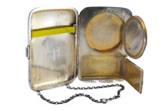 Neceser de plata con espejo en el interior, recipiente para tabaco y cadena multiusos