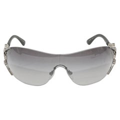 Lunettes de soleil enveloppantes Bvlgari, argentées et ornées de cristaux