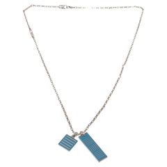 Silver-tone chain necklace with blue and white Damier colour pendant