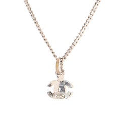 Silver-Tone Long Chain Chanel CC Necklace Features a Solid CC Logo Enamel