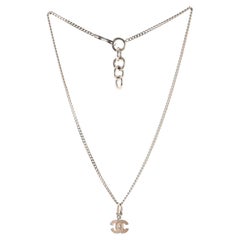 Silver-Tone Long Chain Chanel CC Necklace Features a Solid CC Logo Enamel