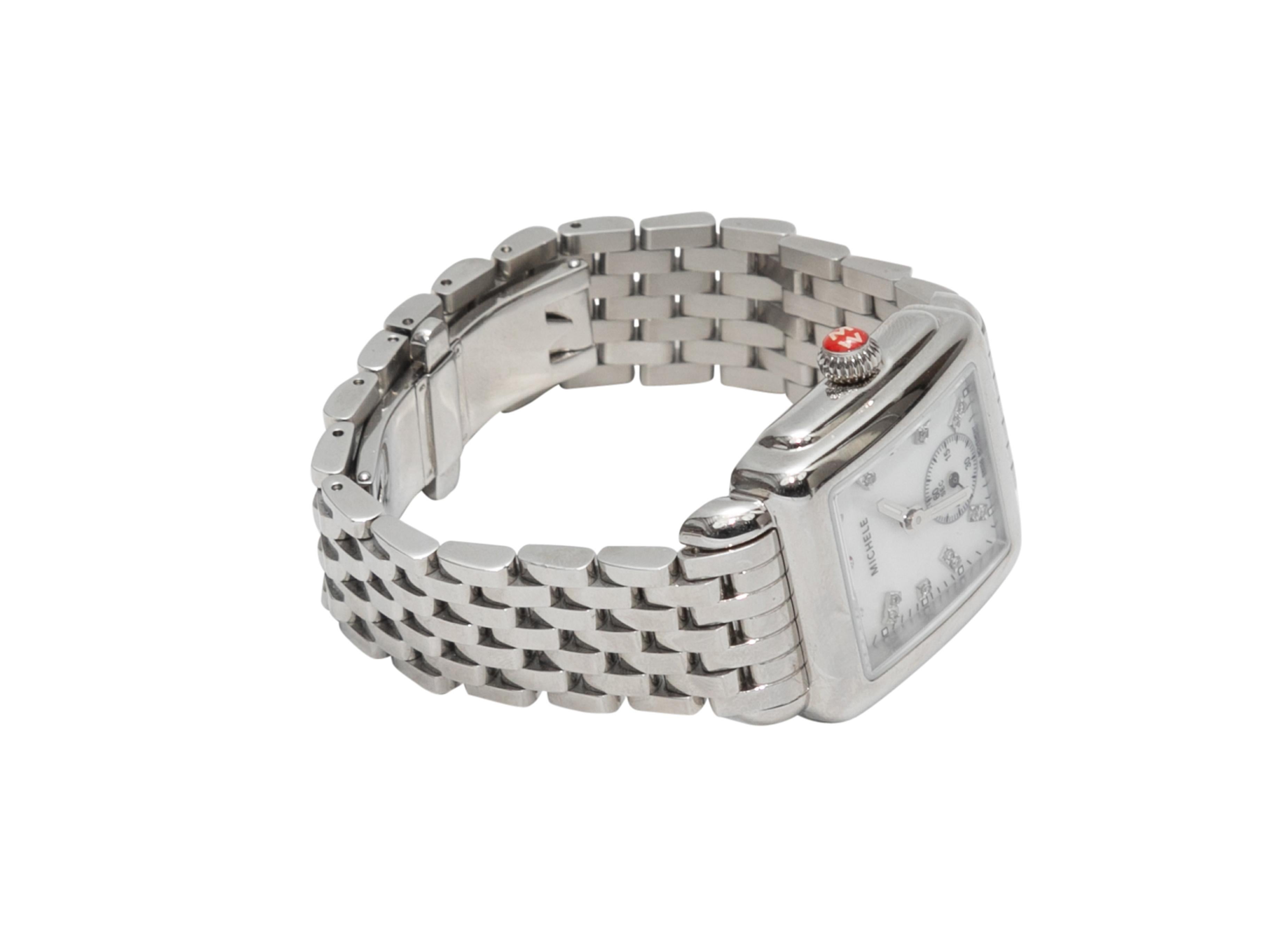 Silver-tone Deco watch by Michele. Diamond hour markings. Clasp closure. 1.5