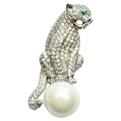 Silver Tone Pavé Panther Brooch with a Faux Pearl and Green Eyes