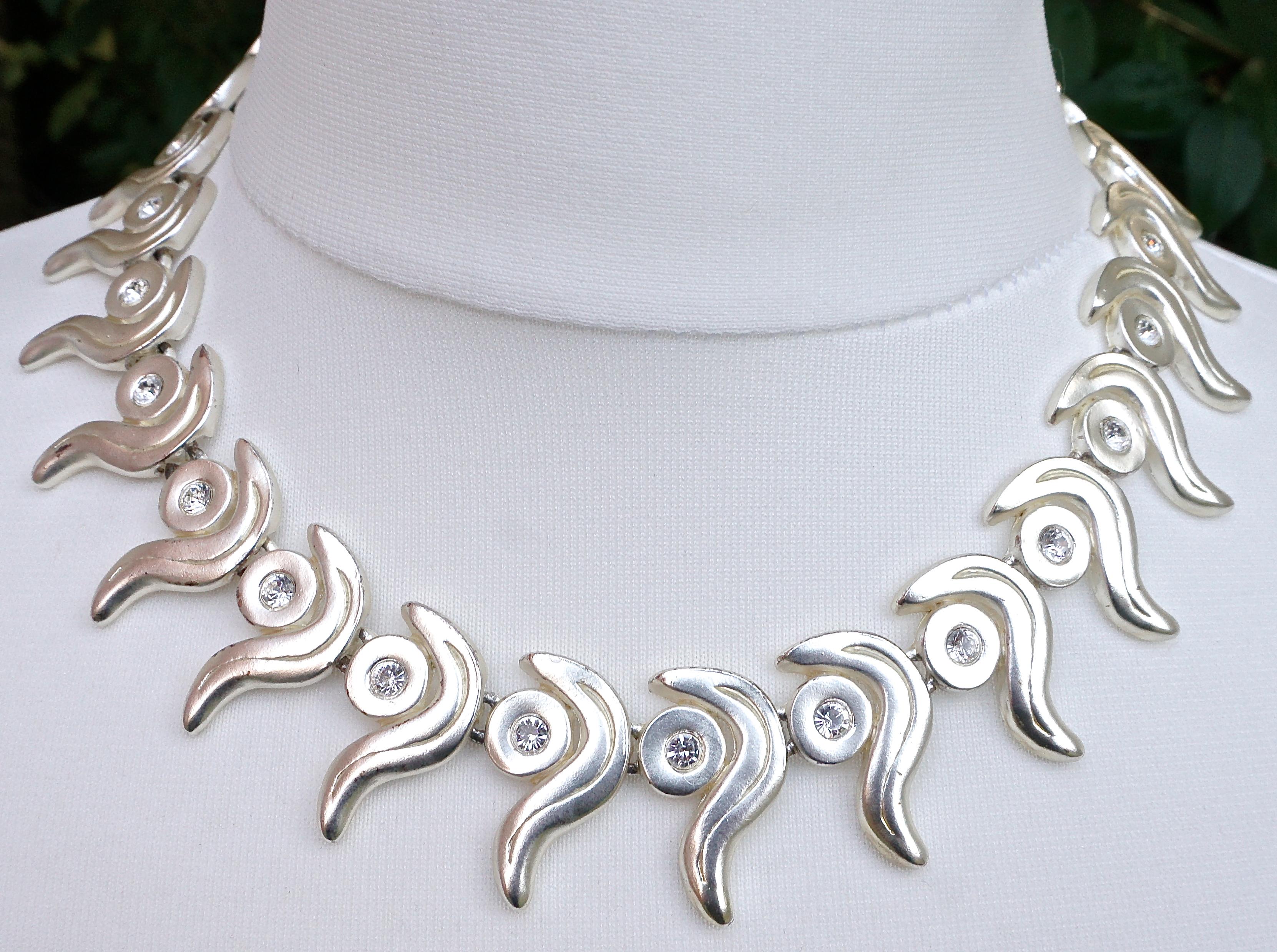 Women's Silver Tone Swirl Design and Clear Rhinestones Link Necklace and Clip Earrings For Sale
