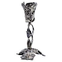 Silver toothpick holder cut out in the shape of a tulip