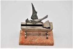 Silver toothpick holder, hummingbird with open wings and resting on a stone base
