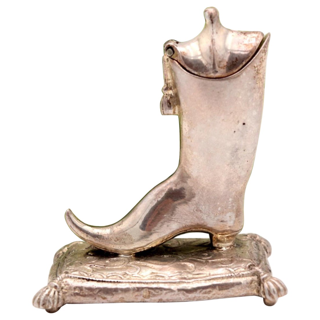 Silver toothpick holder in the shape of a boot