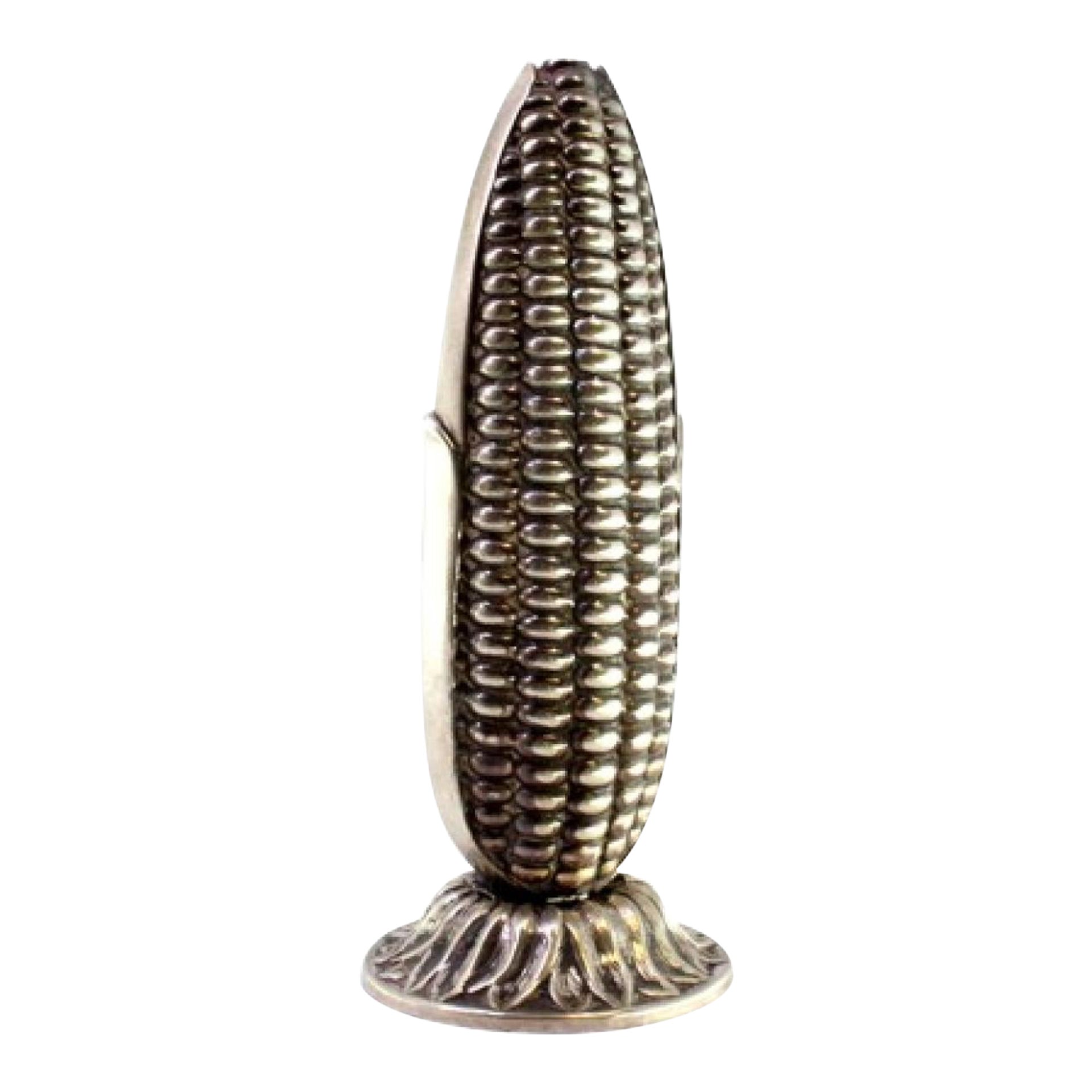 Silver toothpick holder in the shape of a corncob