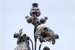 Silver toothpick holder in the shape of a flower vase
