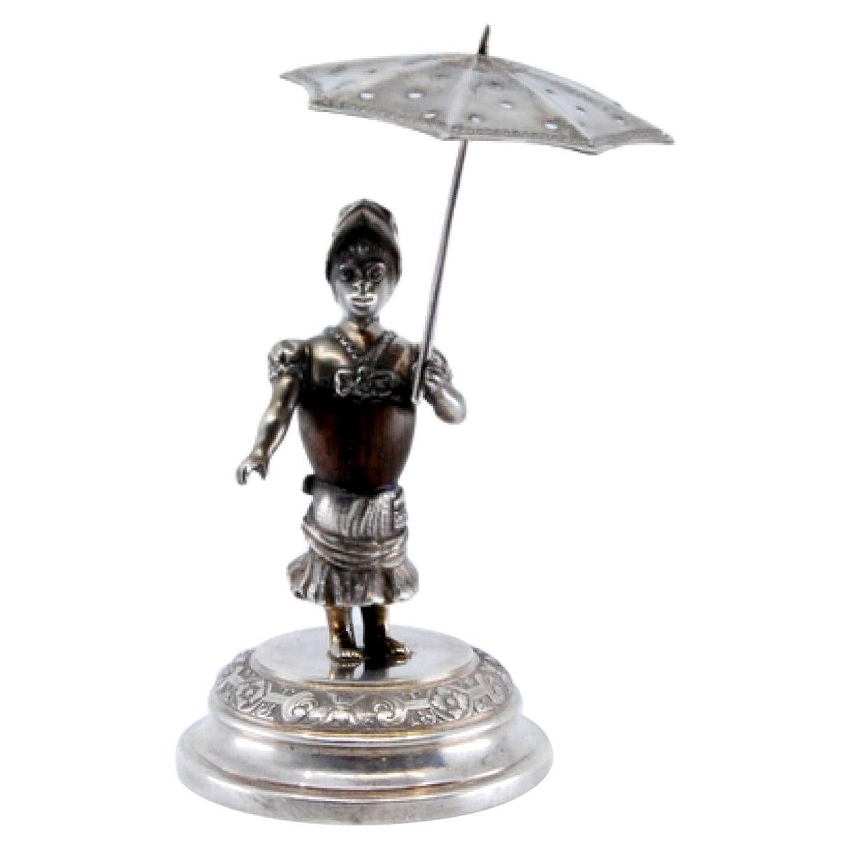 Silver toothpick holder w/ a female figure on a wooden body holding an umbrella
