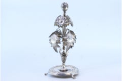 Silver toothpick holder w/ a set of flowers & acanthus leaves topped by a bulb