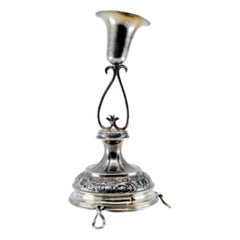 Silver toothpick holder w/ chalice & placed on an engraved base w/ three feet