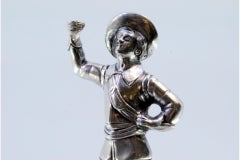 Silver toothpick holder w/ figure of nobleman w/ chalice standing on a plinth