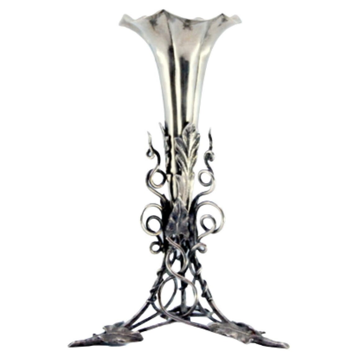Silver toothpick holder w/ flower-shaped chalice
resting on a flowerpot plant