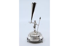 Silver toothpick holder w/ warrior holding spear & resting on an engraved base