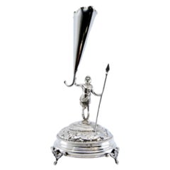 Silver toothpick holder w/ warrior holding spear
resting on an engraved base
