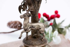 Silver toothpick holder with acacia trunk, leaves, and deer on plinth