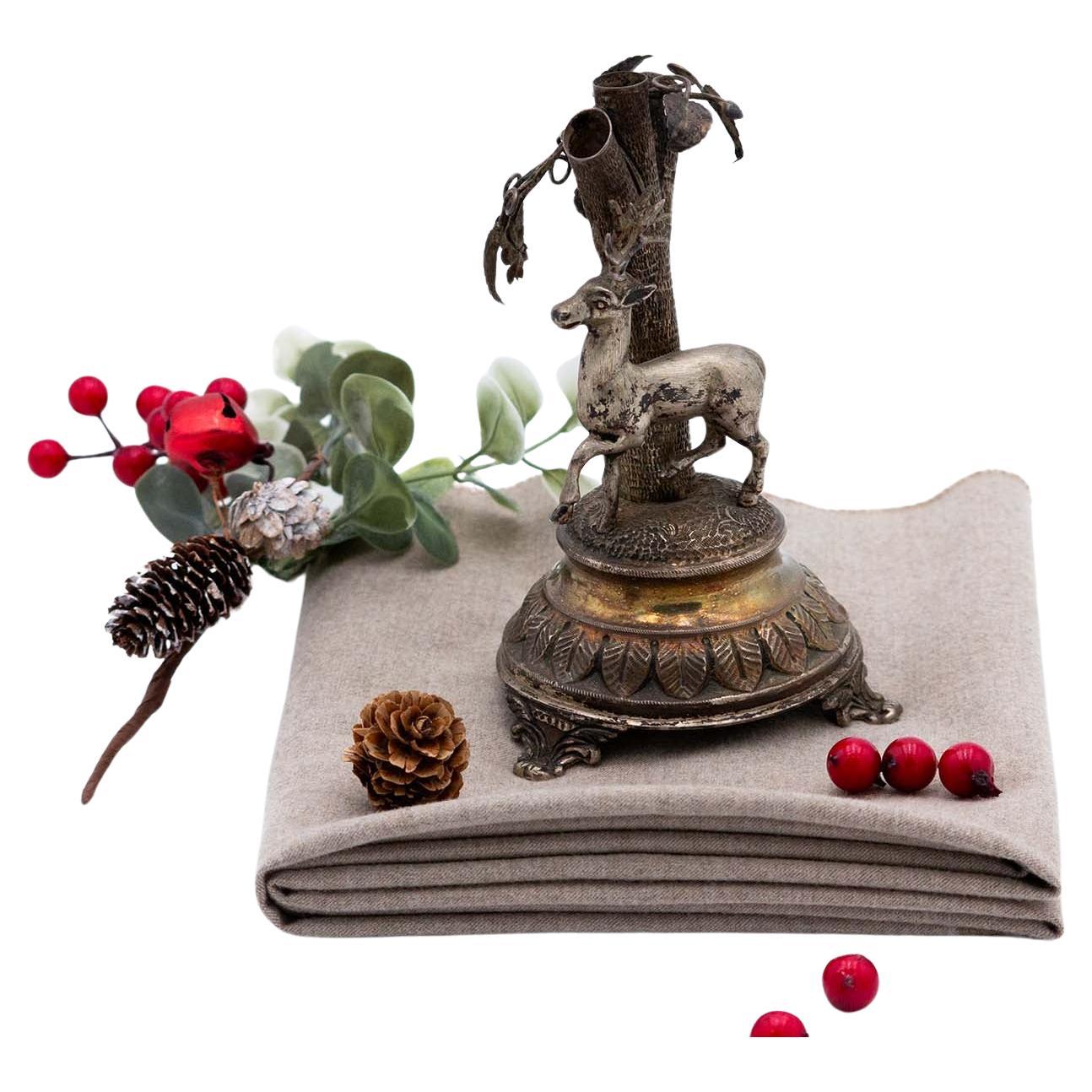 Silver toothpick holder with acacia trunk, leaves, and deer on plinth