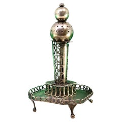 Silver toothpick holder with applications on circular grid base