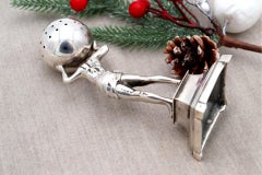 Silver toothpick holder with Atlas figure