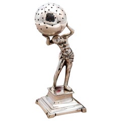 Silver toothpick holder with Atlas figure