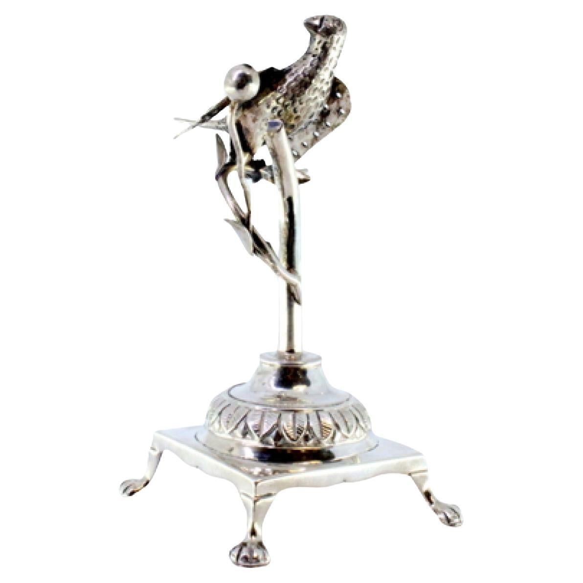 Silver toothpick holder with bird on acacia branch on square base