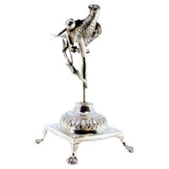 Silver toothpick holder with bird on acacia branch on square base