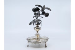 Silver toothpick holder with bird on bouquet on grid base with claws