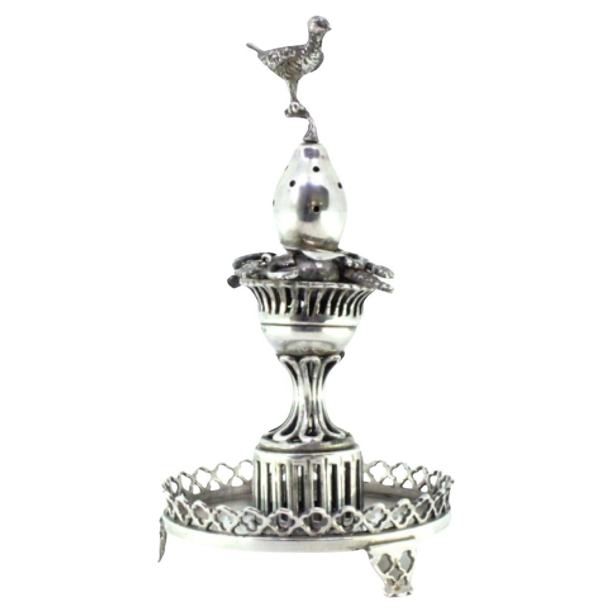 Silver toothpick holder with bird on fruit atop cutout plinth
