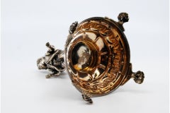 Silver toothpick holder with boy carrying basket on raised base